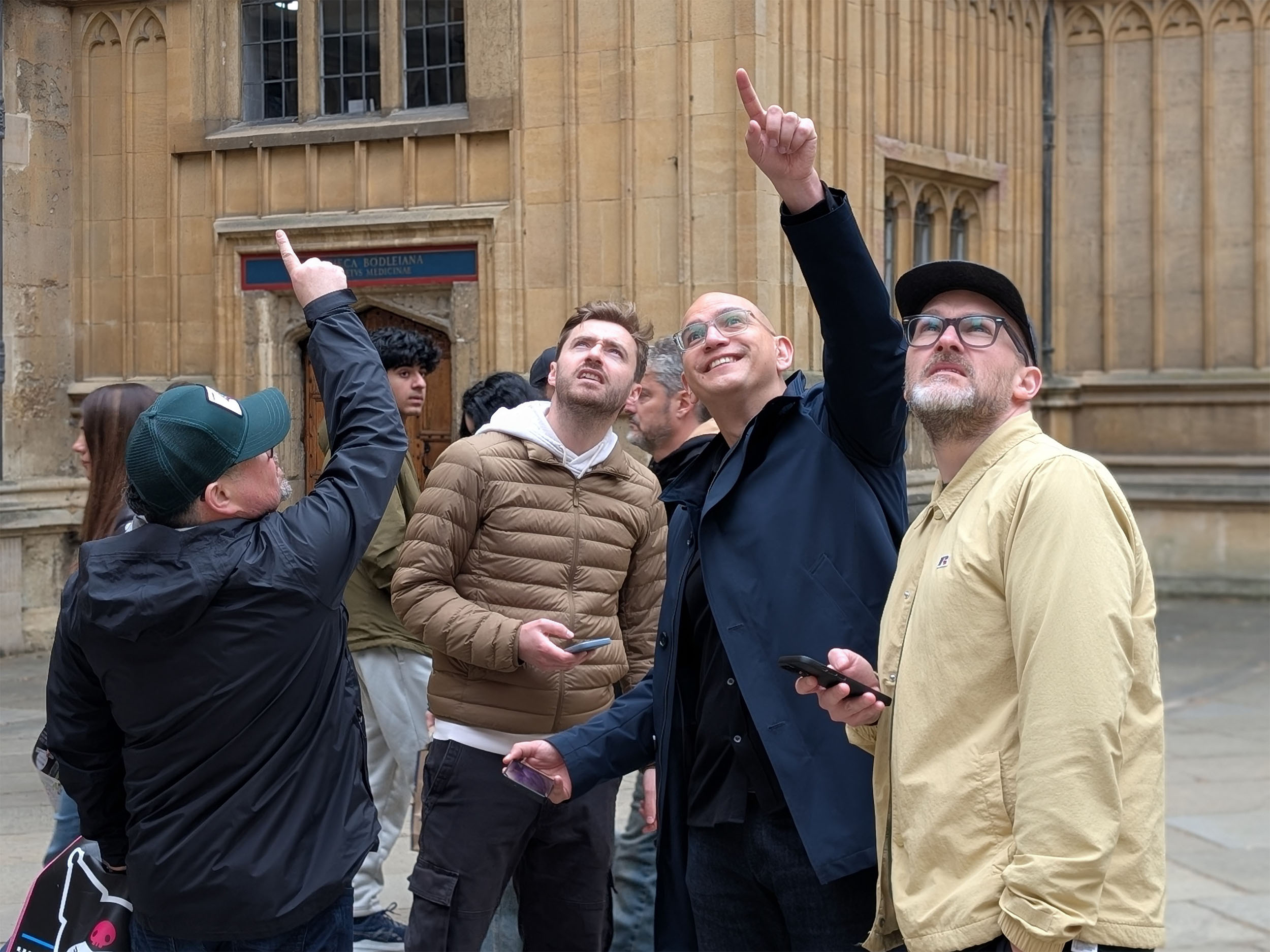 A team playing an Urban Trails puzzle walking tour together.